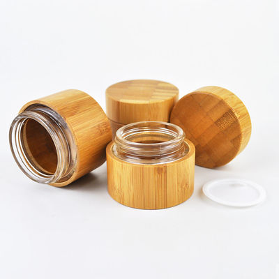 Hölzerner runde Flaschen-natürlicher Bambusbehälter-kosmetisches Glas, das inneres Glas verpackt