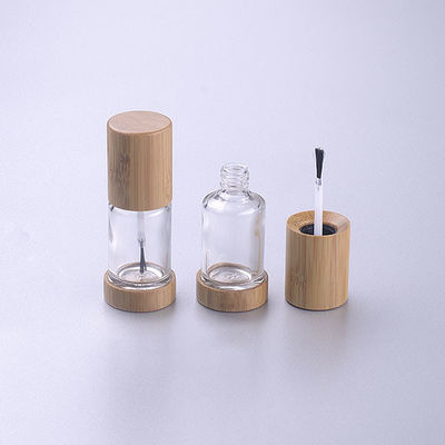 polnische Glasflasche 15ml des leeren Nagels mit hölzerner Bambuskappe der Bürste bilden