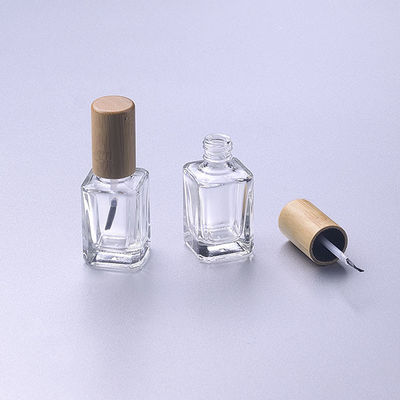 polnische Glasflasche 15ml des leeren Nagels mit hölzerner Bambuskappe der Bürste bilden
