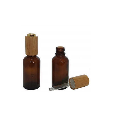 Glasflasche des ätherischen Öls mit Bambuskinderbeständiger Tropfenzähler-Bambuskasten