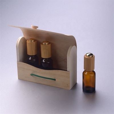 Glasflasche des ätherischen Öls mit Bambuskinderbeständiger Tropfenzähler-Bambuskasten