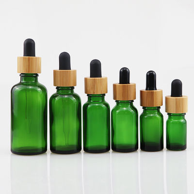 kosmetische Glasflasche des ätherischen Öls 100ml mit Bambustropfenzähler Sorgfalt-Haut Brown