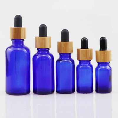 kosmetische Glasflasche des ätherischen Öls 100ml mit Bambustropfenzähler Sorgfalt-Haut Brown