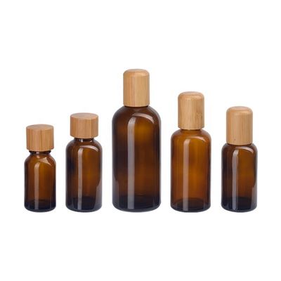 Flasche des ätherischen Öls leeres kosmetisches Brown mit 18mm hölzerner Bambusüberwurfmutter