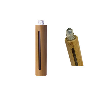 Natürliche kosmetische Glasflasche des ätherischen Öls mit wirklicher Bambuskappen-Metallrolle